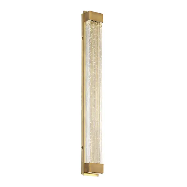 Tower delivers sophisticated luxury with its aged brass finish and V-cut seeded crystal centerpiece. Dual LED modules light the crystal from both ends while a hidden uplight or downlight provides quality indirect illumination—perfect for modern bathrooms and hallways.