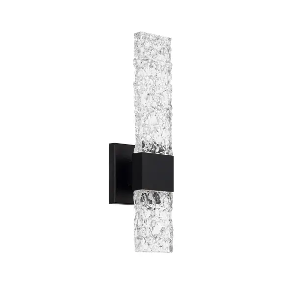 The Reflect wall sconce features free-formed artisan glass that creates a mesmerizing reflecting pool effect. With 850 lumens of warm 3000K LED light and exceptional 90 CRI, it delivers both beauty and performance for residential or commercial settings.