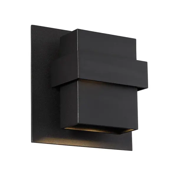 The Pandora wall sconce combines minimalist design with high-performance LED technology. Its tiered sculptural form and dual light points deliver 884 lumens of warm 3000K light, perfect for modern exteriors and interiors alike.