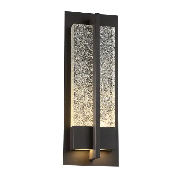 The Omni combines industrial durability with luxury aesthetics through its aluminum construction and elegant Piastra glass. Dual LED positioning provides both ambient and task lighting, making it ideal for exterior applications requiring functional illumination.