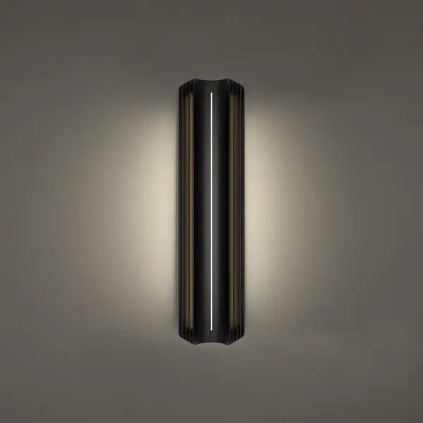 The Kane outdoor wall sconce combines bold architectural design with advanced LED technology. Its curved metal half-circle silhouette creates dramatic side and backlighting effects, perfect for modern exteriors seeking statement lighting.