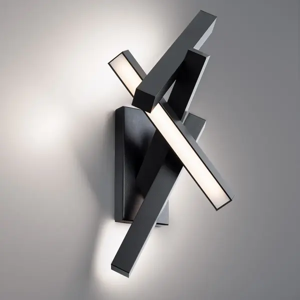 The Chaos collection delivers a striking architectural statement with its random arrangement of illuminated bars. Perfect for creating dramatic impact when stacked in multiples, this energy-efficient LED sconce combines artistic form with functional outdoor lighting.