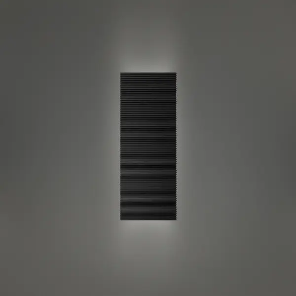 The Pillar outdoor wall sconce delivers sophisticated up/down lighting with its clean rectangular design and striated metal texture. Features color-selectable LED technology and exceptional 90 CRI for true color rendering.