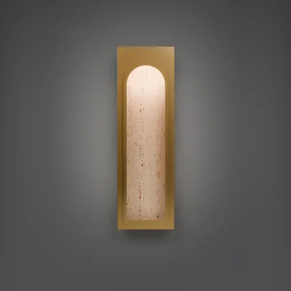 The Cadey wall sconce combines genuine Travertine stone with warm Aged Brass accents for a refined, organic aesthetic. Its focused 3000K LED downlight creates dramatic architectural emphasis while the natural stone texture adds unique character to any space.