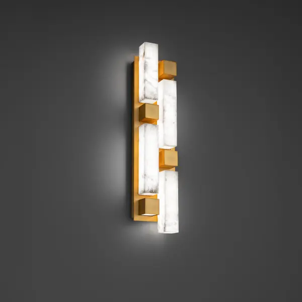 The Voxxel Wall Sconce transforms functional lighting into an art form with its bold geometric design and Spanish Alabaster diffuser. At 25" tall, it creates dramatic visual impact while delivering warm 3000K LED light. - alternate view