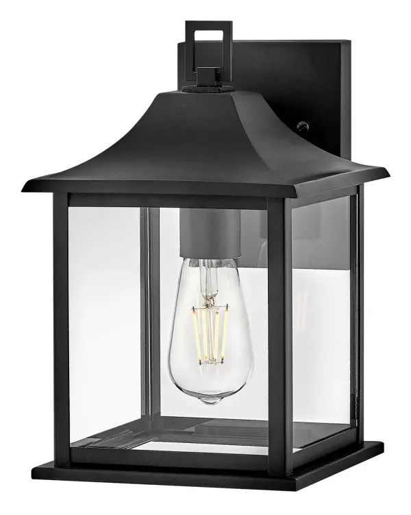 Grand, stately, and as inviting as ever, Nolan stands tall to welcome you home. Clear panes of glass with a bold frame and top hanging loop make this outdoor lantern shine bright with a classic vibe that complements any exterior style. Collection: Nolan Finish: Black Glass: Clear Width: 7.50" Height: 12.00" Length: 8.25" Weight: 3.52 lb Extension from Wall: 8.25" Top to Outlet: 4.00" Canopy: 4.75"W X 6.25"H Number of Bulbs: 1 Maximum Wattage: 10.00 W Bulb Type: E26 Bulb Base: Medium Light Source: LED Dimmable Voltage: 120.00 V Material: Aluminum Country of Origin: CHINA, Safety Listing: C-US Safety Rating: Wet LED Spec Sheet Instructions