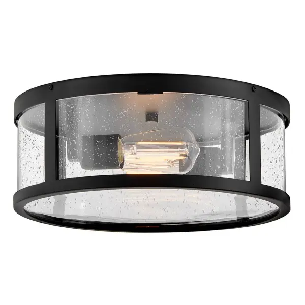 The Alfie flush mount combines timeless lantern styling with modern practicality. Its cylindrical clear seedy glass and black finish create instant curb appeal while the low-profile design works perfectly for covered outdoor spaces.