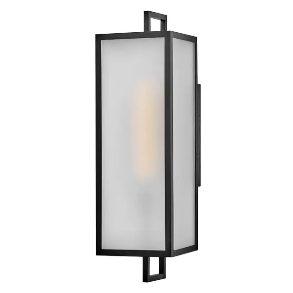 The Halden wall lantern combines modern rectangular framing with classic lantern styling in a sophisticated black finish. Large etched glass panels create a warm, diffused glow while the open bottom design ensures easy bulb maintenance.