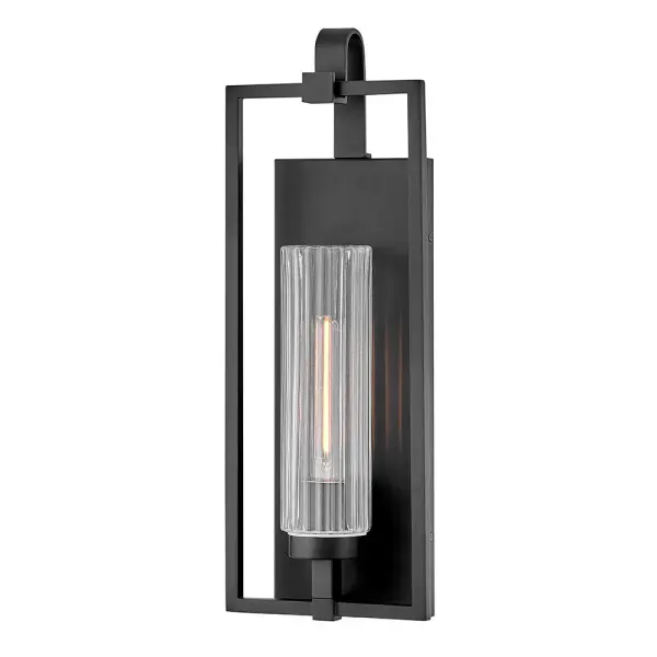 The Stassi wall lantern brings vintage charm to any exterior space with its classic profile and versatile black finish. At 21 inches tall, it provides substantial presence while complementing traditional and farmhouse aesthetics.