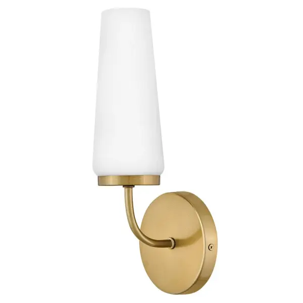 The Selma sconce combines classic design with modern luxury through its tapered etched opal glass shade and rich Gold finish. Perfect for bathrooms and hallways, this compact fixture delivers soft, diffused light. - alternate view