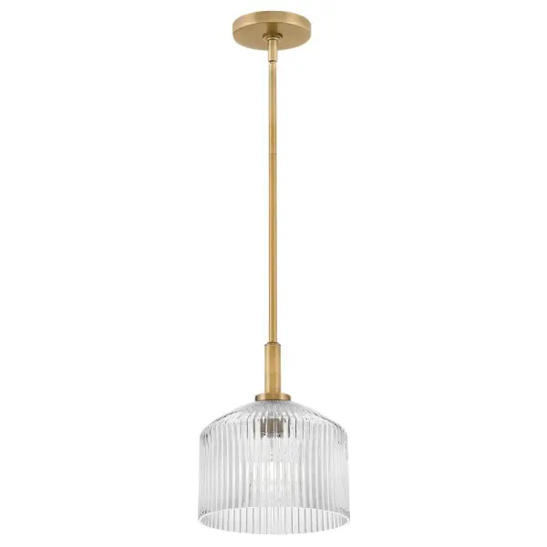 The Lisette Small Pendant brings mid-century charm with its ribbed glass shade and lacquered brass finish. Perfect for adding vintage character to compact spaces, its textured glass creates beautiful light refractions.