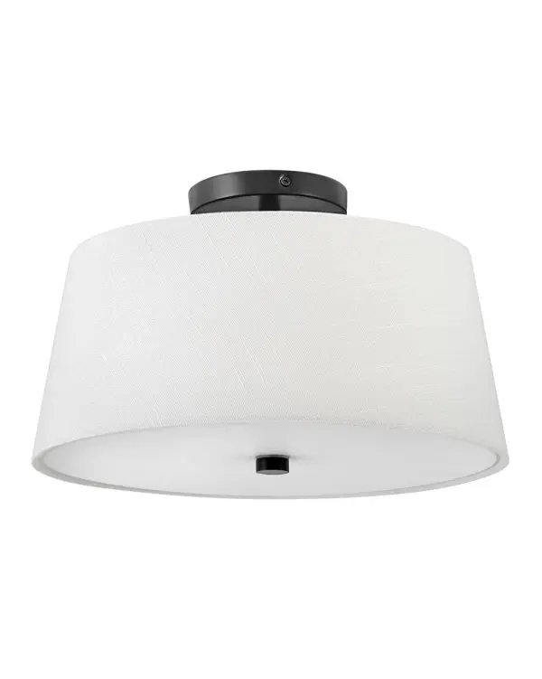 The Beale flush mount combines angular modern lines with a soft white linen shade for versatile appeal. Its low-profile design and diffused lighting make it ideal for spaces with standard ceiling heights.