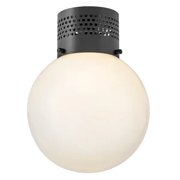 The Taj Small Flush Mount combines contemporary style with functional elegance. Its cased opal glass globe softly diffuses light while perforated metal details create a captivating speckled effect, perfect for intimate spaces.