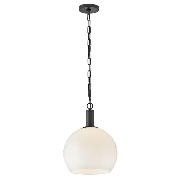 The Rivi Medium Pendant combines minimalist design with sophisticated details. Its oversized cased opal glass shade provides soft, diffused light while the cast knurled accent adds textural interest. Perfect as a single statement piece or grouped for dramatic effect.