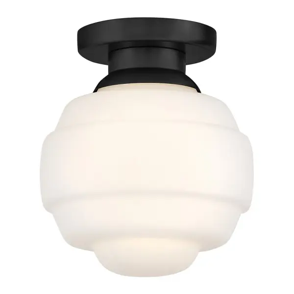 The Penny Extra Small Flush Mount brings retro-inspired charm to smaller spaces with its classic schoolhouse glass design. Perfect for hallways, closets, and bathrooms where ceiling clearance is limited.