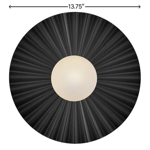 The Stevie combines pleated cast metal texture with flexible mounting options. Its compact 13.75" profile works beautifully as either a flush mount ceiling fixture or wall sconce, making it ideal for smaller spaces. - alternate view