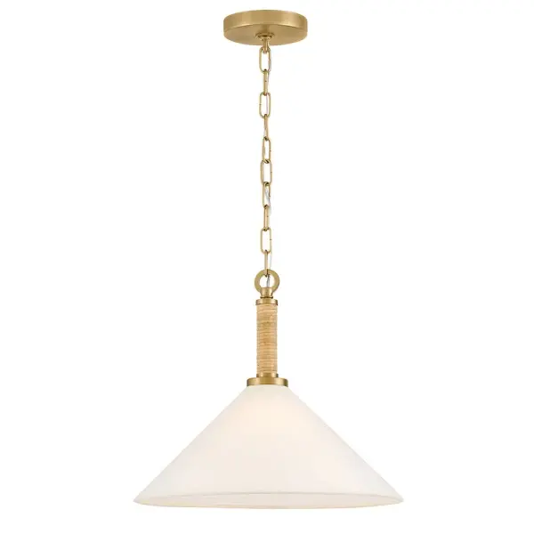 The Cove pendant beautifully blends coastal charm with organic modern style through its bamboo rattan-wrapped stem and off-white linen shade. The lacquered brass finish adds warmth while the natural materials create visual interest and texture.