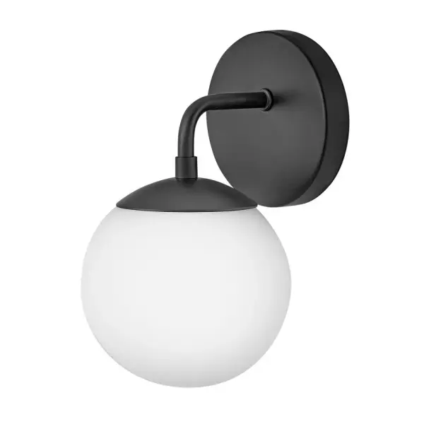 The Julep vanity light combines modern simplicity with functional design. Its etched opal glass globe provides perfectly diffused lighting for grooming tasks, while the sleek black finish adds contemporary style to any bathroom.
