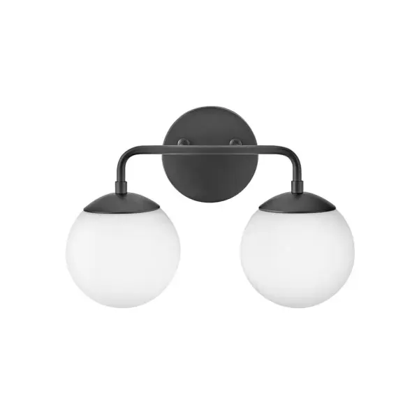 The Julep vanity light combines modern simplicity with functional design. Two etched opal glass globes provide perfectly diffused lighting for grooming tasks, while the sleek black finish adds contemporary style to any bathroom.