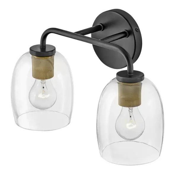 The Percy vanity light combines transitional elegance with industrial detailing through distinctive bell-shaped glass shades and a striking black and brass finish. Perfect for bathrooms seeking both style and function. - alternate view