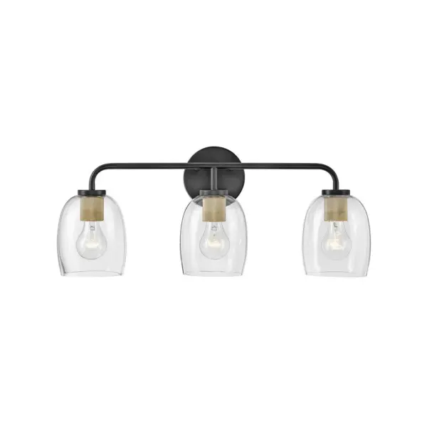 The Percy vanity light combines transitional style with industrial detailing through distinctive bell-shaped glass shades and a striking black finish with brass accents. Its versatile up-or-down installation makes it adaptable to any bathroom layout.