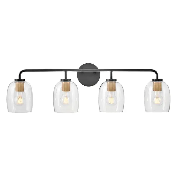 Percy combines transitional elegance with industrial detailing through distinctive bell-shaped glass shades and a striking black finish with brass accents. Four lights provide ample illumination for larger vanities.