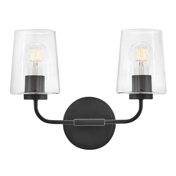 The Kline vanity light delivers clean, transitional style with a no-nonsense approach. Its pared-down black finish and clear glass shades provide functional lighting while maintaining a supremely stylish profile.