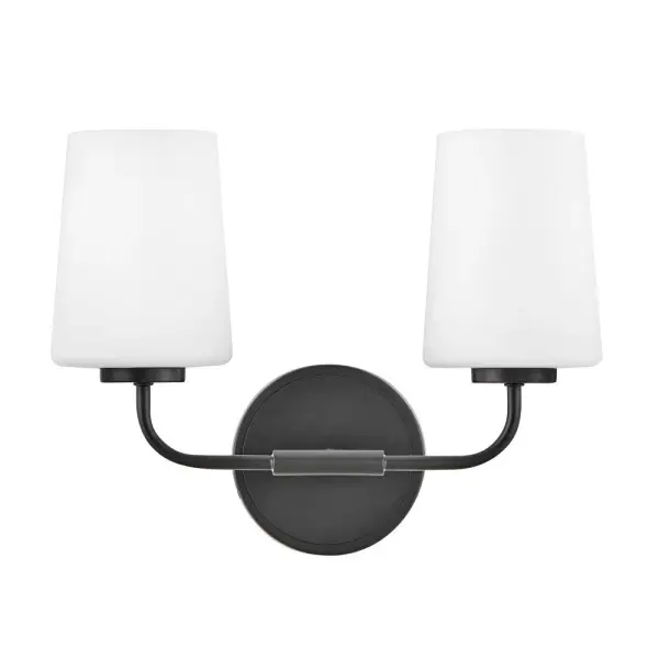 The Kline vanity light delivers understated elegance with its pared-down transitional design. Perfect for modern bathrooms seeking a no-fuss, supremely stylish lighting solution in a compact 14.25-inch width.
