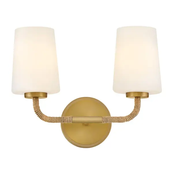 The Kline vanity light combines nautical charm with contemporary minimalism. Natural rope-wrapped arms and lacquered brass finish create a sophisticated coastal aesthetic, while sleek glass shades provide clean, functional lighting.