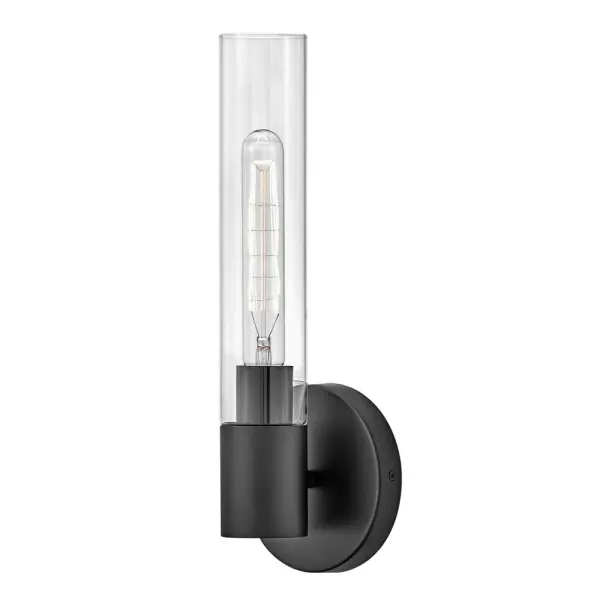 The Shea vanity light combines minimalist elegance with practical functionality. Its elongated cylindrical glass shade and versatile black finish make it adaptable to various design schemes while providing focused task lighting.