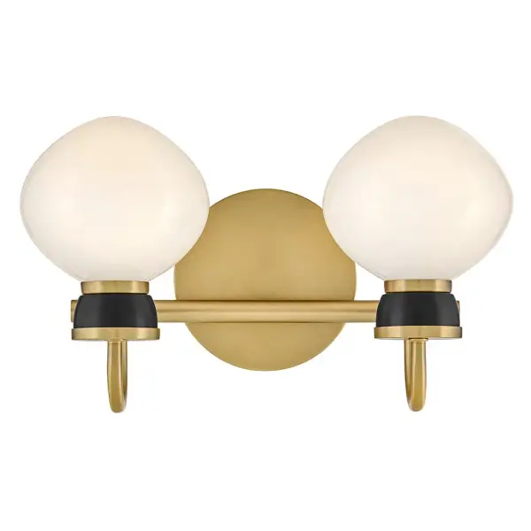 The Lucy vanity light combines classic schoolhouse glass shades with contemporary brass and black accents, creating a petite fixture that delivers both style and function for smaller bathroom spaces. - alternate view