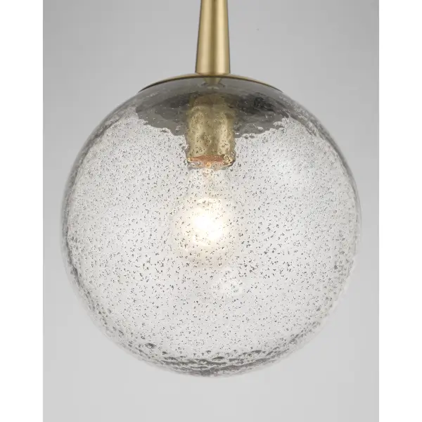 The Populuxe mini pendant combines unique volcanic glass with oxidized aged brass for a sophisticated modern look. At 19 inches tall and 9 inches wide, it's perfectly scaled for kitchen islands, dining nooks, or as accent lighting. - alternate view