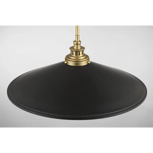 The Segan pendant combines contemporary design with industrial edge through its dramatic 20-inch coal metal shade accented with soft brass details. Perfect for making a statement over kitchen islands or dining tables. - alternate view