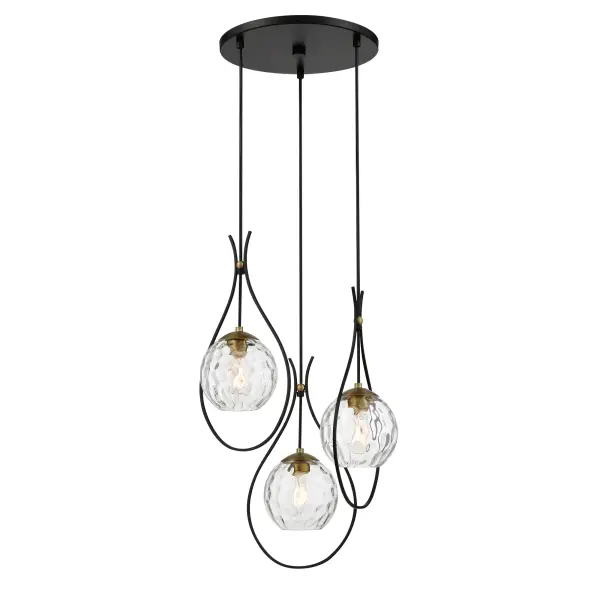 The Cody 3-Light Pan Pendant combines coal black and soft brass finishes with clear water glass for a refined transitional look. Its 19-inch diameter makes it versatile for kitchen islands, dining areas, and entryways.
