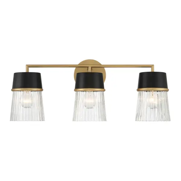 The Stamford 24" vanity light combines dark matte black with legacy brass accents and clear glass shades for a sophisticated transitional look. Perfect for medium-sized bathrooms, this 3-light fixture offers versatile style.