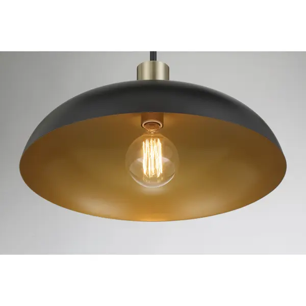 The Biloxi pendant combines coal black steel with weathered antique brass detailing for an industrial aesthetic that works in both modern and transitional spaces. At 17.75" wide, it's perfectly sized for kitchen islands, dining nooks, or as a statement piece in entryways. - alternate view