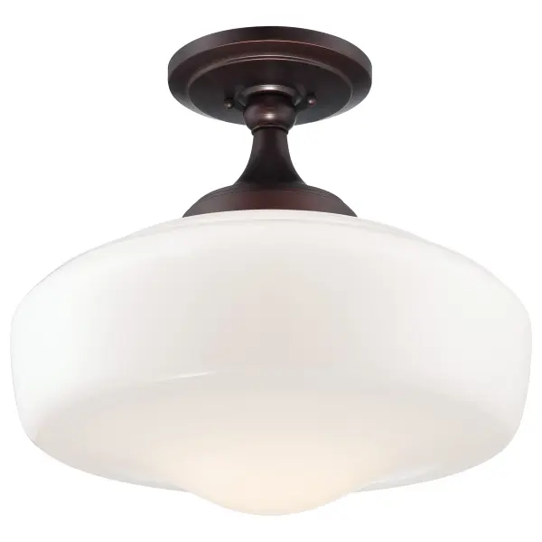 This semi-flush mount combines timeless schoolhouse styling with a warm brushed bronze finish. The opal glass shade provides soft, diffused lighting ideal for smaller spaces with standard ceiling heights.