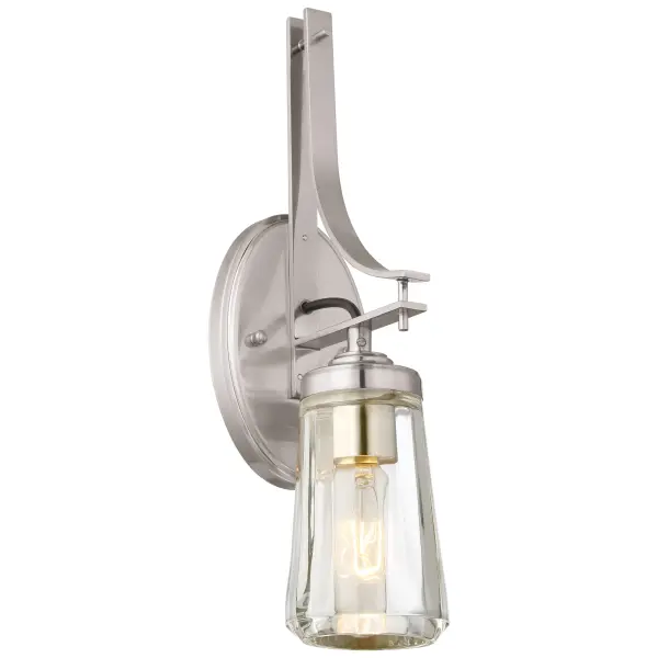 The Poleis bath sconce combines clean lines with classic materials, featuring a brushed nickel finish and clear glass shade. Its compact 5.5-inch width makes it ideal for flanking mirrors in bathrooms of any size.