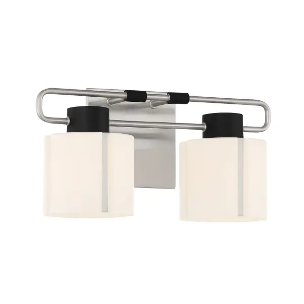 The Waverly Plaza 2-Light Bath Vanity combines modern styling with practical illumination. Featuring brushed nickel with coal accents and etched opal glass shades, it delivers even, flattering light perfect for grooming tasks.