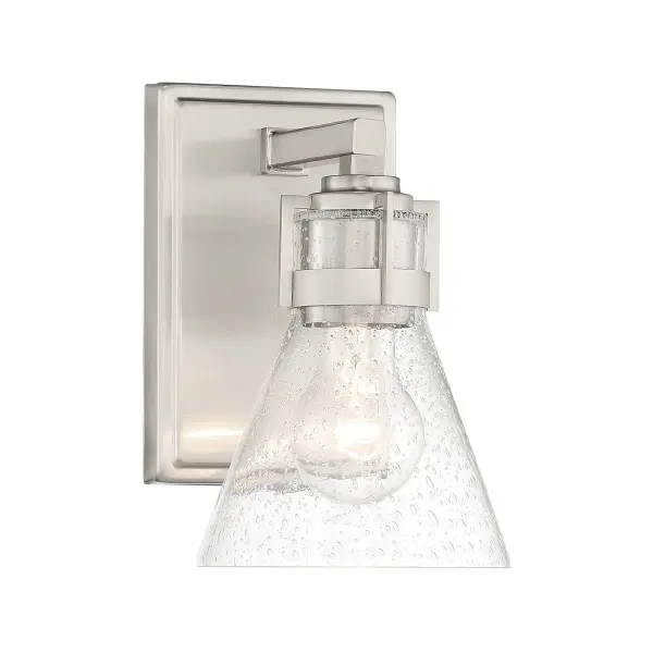 The Chatham Square bath light combines modern brushed nickel finish with timeless seeded glass for a versatile vanity solution. Its compact 5.5-inch width makes it ideal for smaller bathrooms or powder rooms.