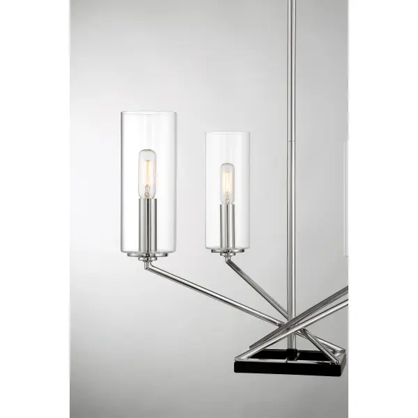 The Highland Crossing chandelier combines traditional styling with a two-tone finish for timeless appeal. Its compact 18-inch width makes it perfect for smaller dining spaces, breakfast nooks, or bedrooms while the clear glass shades provide bright, unobstructed light. - alternate view