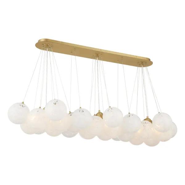 The Langford 12-light island chandelier combines transitional elegance with modern functionality. Its generous 54.75" length and Legacy Brass finish create a sophisticated focal point over kitchen islands and dining tables.