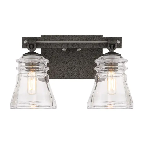 The Graham Avenue 2-Light Bath combines traditional elegance with modern functionality. Its mixed metal finish of smoked iron and brushed nickel creates visual interest, while clear pressed glass shades provide ample illumination. - alternate view