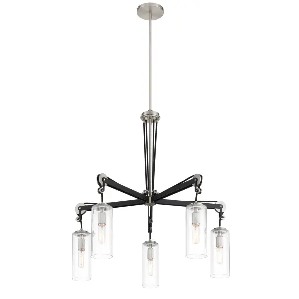 The Pullman Junction chandelier blends industrial charm with contemporary elegance. Five candelabra lights behind clear glass shades create warm ambiance, while the brushed nickel and coal finish adds sophisticated contrast.