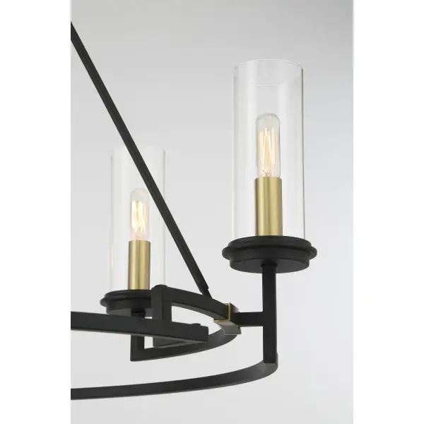 The Hillstone chandelier combines contemporary design with industrial charm through its striking two-tone finish. Six candelabra lights provide ample illumination while clear glass shades maintain an airy aesthetic. - alternate view