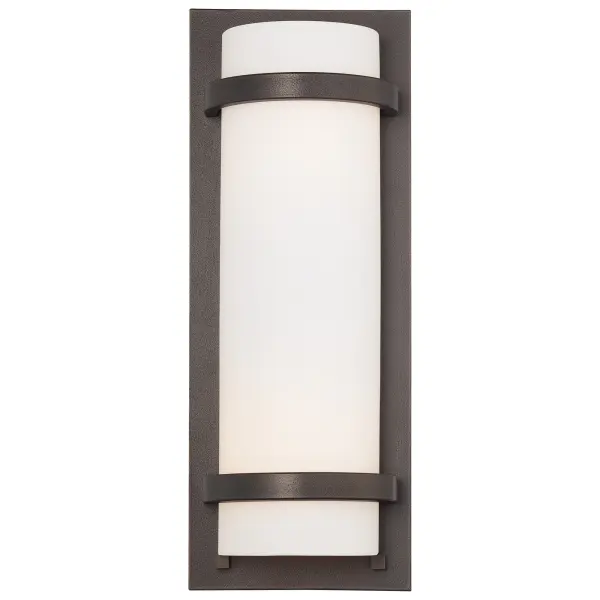 The Fieldale Lodge wall sconce combines transitional styling with practical features. Its smoked iron finish and etched white glass create warm, diffused lighting perfect for hallways and intimate spaces. ADA compliant and dimmable.