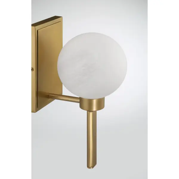 The Mooncrest 6" vanity light delivers warm, transitional style in a space-saving design. Its Legacy Brass finish and etched alabaster glass create soft, flattering illumination perfect for powder rooms and smaller bathrooms. - alternate view