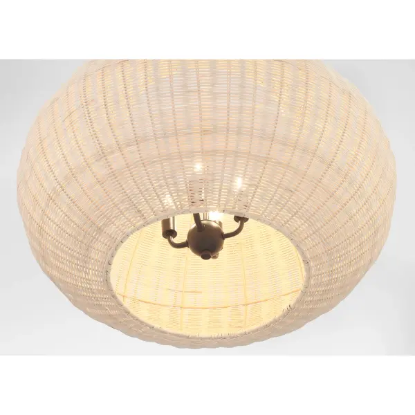 The Modjeska pendant blends natural rattan texture with sleek coal black metal for a striking organic modern aesthetic. At 24 inches wide, it provides substantial presence while maintaining an airy, approachable feel perfect for casual dining spaces. - alternate view