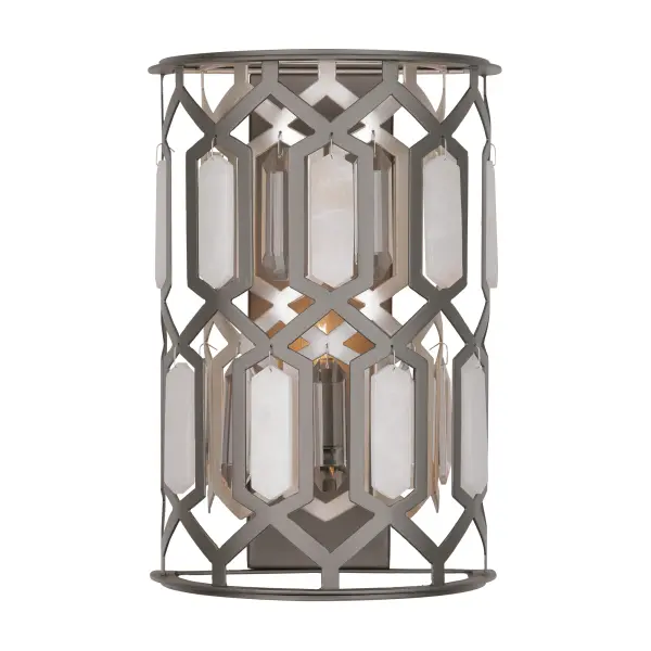 The Hexly wall sconce combines contemporary design with artisanal materials, featuring clear crystal and alabaster stone accents in a bronze and sultry silver finish. At 16" tall, it provides elegant ambient lighting.