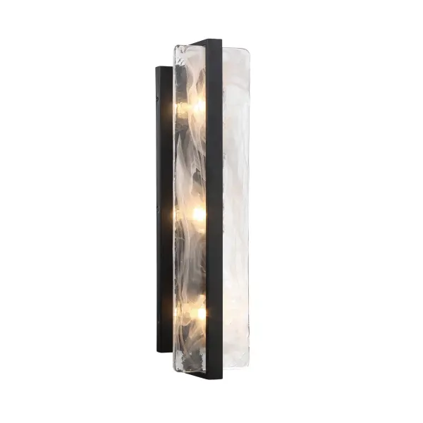 The Cloud Break wall sconce combines contemporary black steel with soft cloud glass for sophisticated ambient lighting. Its vertical design and ADA compliance make it ideal for bathrooms and hallways where style meets function.
